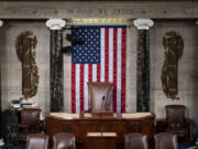 FILE - The speaker's dais is seen in the House of Representatives of the Capitol in Washington, Feb. 28, 2022. After House Speaker Kevin McCarthy was voted out of the job by a contingent of hard-right conservatives this week, House GOP leaders are now grappling to find a new speaker. With no speaker of the House, a constitutional officer second in line to the presidency, the Congress cannot fully function -- to pass laws, fund the government and otherwise serve as the branch of government closest to the people -- during a time of simmering uncertainty at home and abroad. (AP Photo/J.