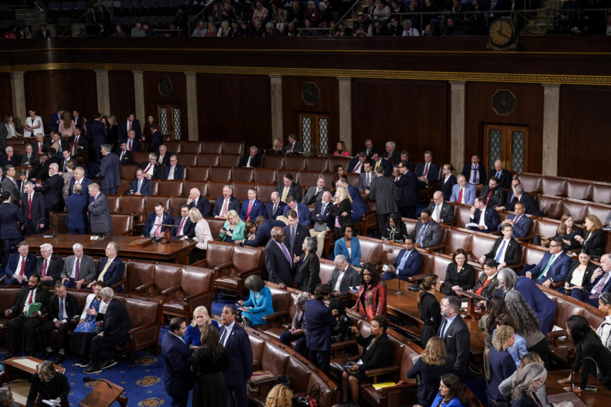 Members of the House gather as Republicans try to elect Rep. Jim Jordan, R-Ohio, the Judiciary chairman and a top Donald Trump ally, to be the new House speaker, at the Capitol in Washington, Tuesday, Oct. 17, 2023. (AP Photo/J.