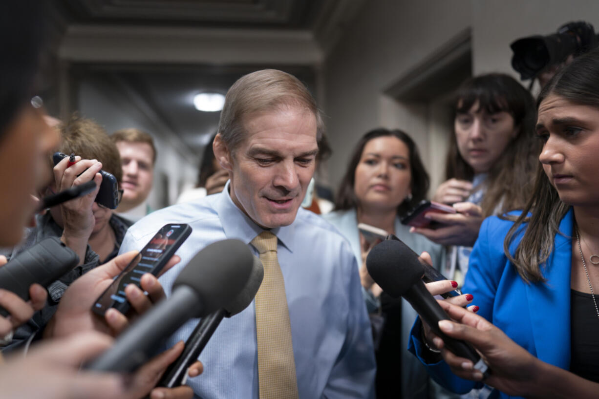 Rep. Jim Jordan, R-Ohio, chairman of the House Judiciary Committee and a staunch ally of former President Donald Trump, talks with reporters as House Republicans meet again behind closed doors to find a path to elect a new speaker after House Majority Leader Steve Scalise, R-La., dropped out of the race Thursday night, at the Capitol in Washington, Friday, Oct. 13, 2023. (AP Photo/J.