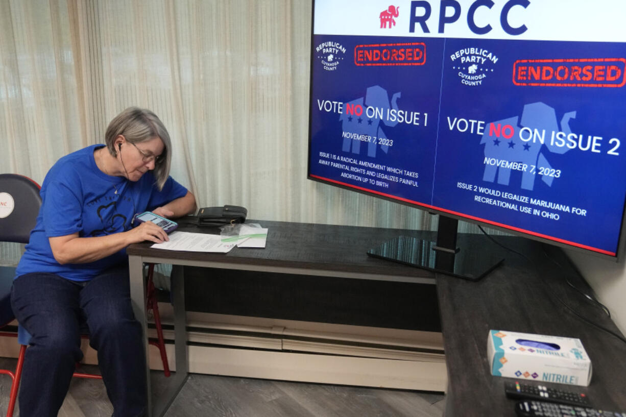 Doris Peters calls voters during a phone bank event Thursday, Sept. 28, 2023, at the Republican Party of Cuyahoga County in Independence, Ohio.