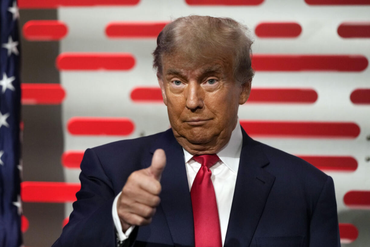 Former President Donald Trump gesture to the crowd before his speech at the California Republican Party Convention Friday, Sept. 29, 2023, in Anaheim, Calif. (AP Photo/Jae C.