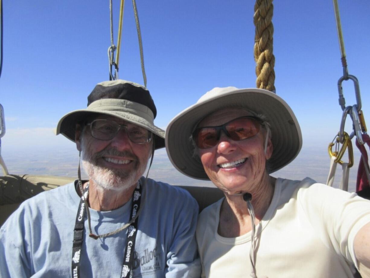 This 2019 image provided by Barbara Fricke shows Fricke and Peter Cuneo in a balloon basket. It's been 15 years since the world's elite gas balloon pilots have gathered in the United States for the Coupe Gordon Bennett, a long-distance race whose roots stretch back more than a century. Fricke and Cuneo will be participating in the 2023 Gordon Bennett competition. The flight window opens Saturday, Oct. 7.
