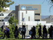 Healthcare workers picket outside Kaiser Permanente hospital during a nationwide strike, Wednesday, Oct. 4, 2023, in Moreno Valley, Calif.Some 75,000 Kaiser Permanente workers who say understaffing is hurting patient care have walked off the job in multiple states, kicking off a major health care worker strike.