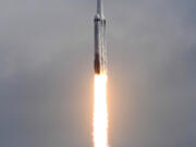 A SpaceX Falcon Heavy rocket lifts off from pad 39A at the Kennedy Space Center in Cape Canaveral, Fla., Friday, Oct. 13, 2023. The spacecraft will travel to the metallic asteroid Psyche, where it will enter orbit in 2029 and be the first spacecraft to explore a metal-rich asteroid.