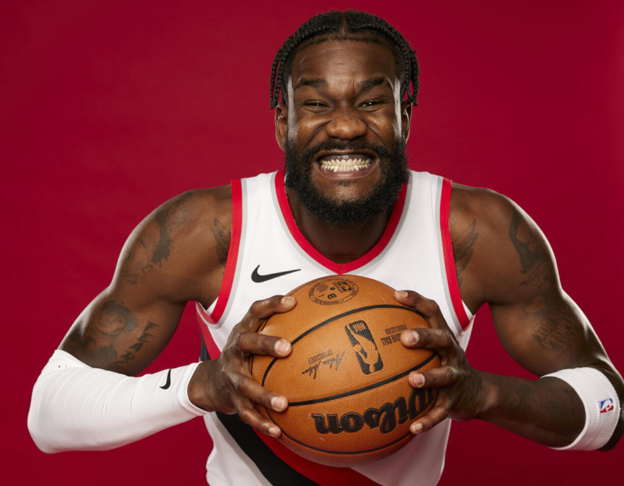 Portland Trail Blazers center Deandre Ayton poses for a portrait during the NBA basketball team's media day in Portland, Ore., Monday, Oct. 2, 2023.