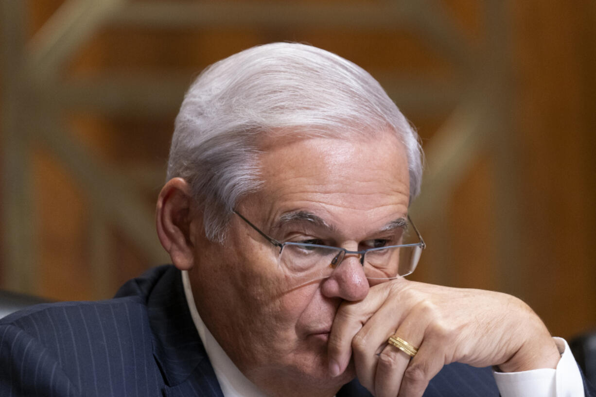 FILE - Sen. Bob Menendez, D-N.J., listens during a Senate Foreign Relations Committee hearing on Wednesday, Oct. 18, 2023, at the Capitol in Washington. Menendez returns to Manhattan federal court on Monday, Oct. 23, to enter a not guilty plea to a conspiracy charge alleging that he acted as an agent of the Egyptian government even as he chaired the Senate Foreign Relations Committee.