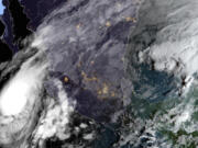 This satellite image provided by NOAA at 8am E.T. on Tuesday, Oct. 10, 2023 shows Hurricane Lidia in the Pacific Ocean approaching Puerto Vallarta, Mexico.