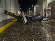 A communications antenna lays on the street after Hurricane Lidia hit, in Puerto Vallarta, Mexico, Wednesday, Oct. 11, 2023. Lidia dissipated Wednesday after hitting land as a Category 4 hurricane.