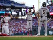 Arizona Diamondbacks' Lourdes Gurriel Jr. celebrates after a home run off Philadelphia Phillies starting pitcher Aaron Nola during the second inning in Game 6 of the baseball NL Championship Series in Philadelphia Monday, Oct. 23, 2023.