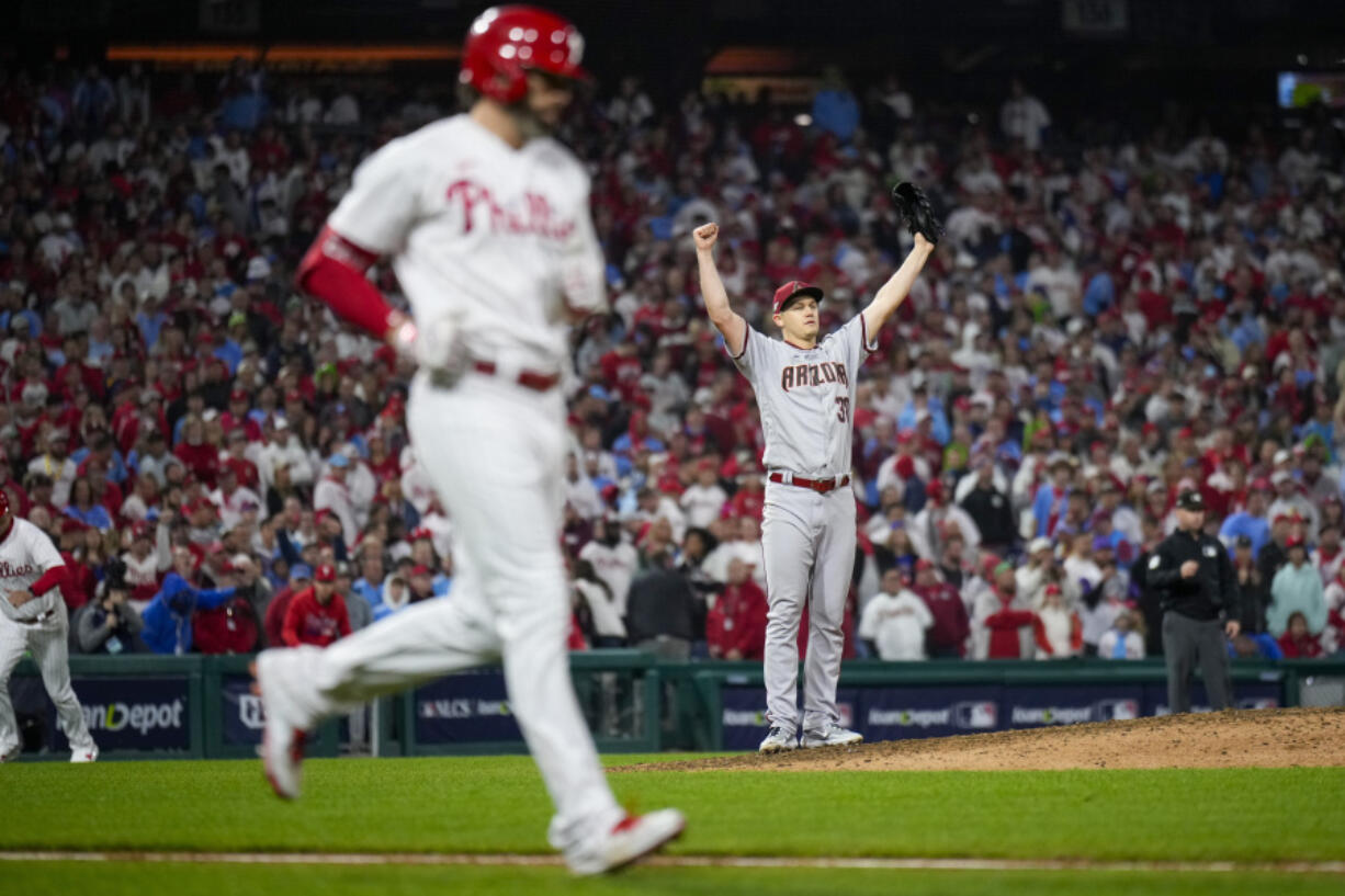 Arizona relief pitcher Paul Sewald celebrates the final out against the Philadelphia Phillies to win Game 7 and the NL Championship Series on Tuesday. The Diamondbacks advance to the World Series where they will play the Texas Rangers beginning Friday.