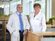 In this undated image provided by Penn Medicine, Katalin Karik? and Drew Weissman pose for a photo at the University of Pennsylvania in Philadelphia. Karik? and Weissman won the Nobel Prize in medicine on Monday, Oct. 2, 2023, for discoveries that enabled the creation of mRNA vaccines against COVID-19 and that could be used to develop other shots in the future.