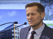 FILE - Hungarian physicist Ferenc Krausz speaks on, Feb. 14, 2022, in Budapest, Hungary. Three scientists have won the Nobel Prize in physics for their work on how electrons move around the atom during the tiniest fractions of seconds. The field could one day lead to better electronics or disease diagnoses. The prize went to Pierre Agostini of The Ohio State University in the U.S.; Ferenc Krausz of the Max Planck Institute of Quantum Optics and Ludwig Maximilian University of Munich in Germany; and Anne L'Huillier of Lund University in Sweden.