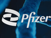 FILE - The Pfizer logo is displayed at the company's headquarters, Friday, Feb. 5, 2021, in New York. Shares of Pfizer are falling before the market opened on Monday, Oct.