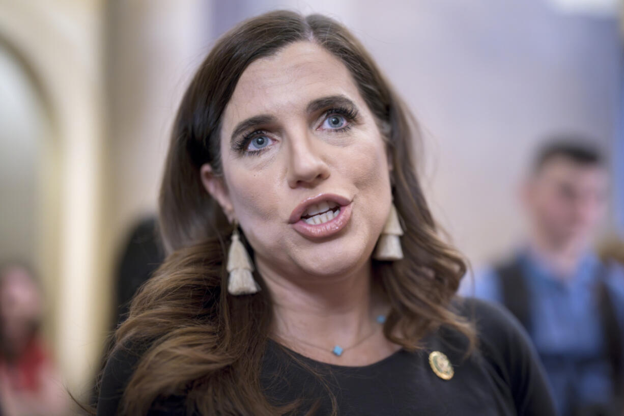 FILE - Rep. Nancy Mace, R-S.C., speaks with reporters at the Capitol in Washington, May 24, 2023. The Supreme Court is taking up a new congressional redistricting case, this time from South Carolina, that could shape the fight for partisan control of the House of Representatives. Arguments taking place at the high court on Oct. 11 will focus on a coastal district that is held by Mace. (AP Photo/J.