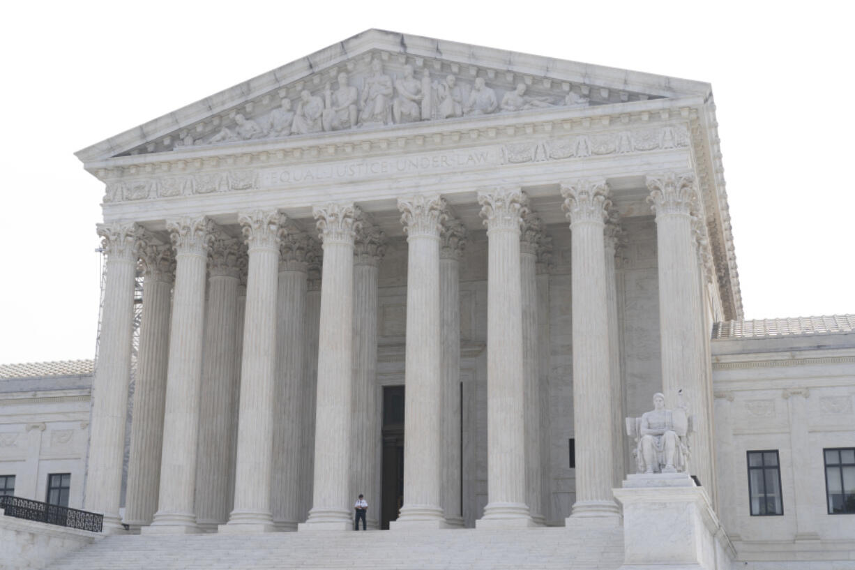 FILE - The Supreme Court is seen on June 30, 2023, in Washington. Charles and Kathleen Moore are about to have their day in the Supreme Court over a $15,000 tax bill they believe is unconstitutional. The Redmond, Wash., couple claim they had to pay the money because of their investment in an Indian company from which, as Charles Moore, 62, said in a sworn statement, they "have never received a distribution, dividend, or other payment." But significant parts of the story they have told to reach this point seem at odds with public records.