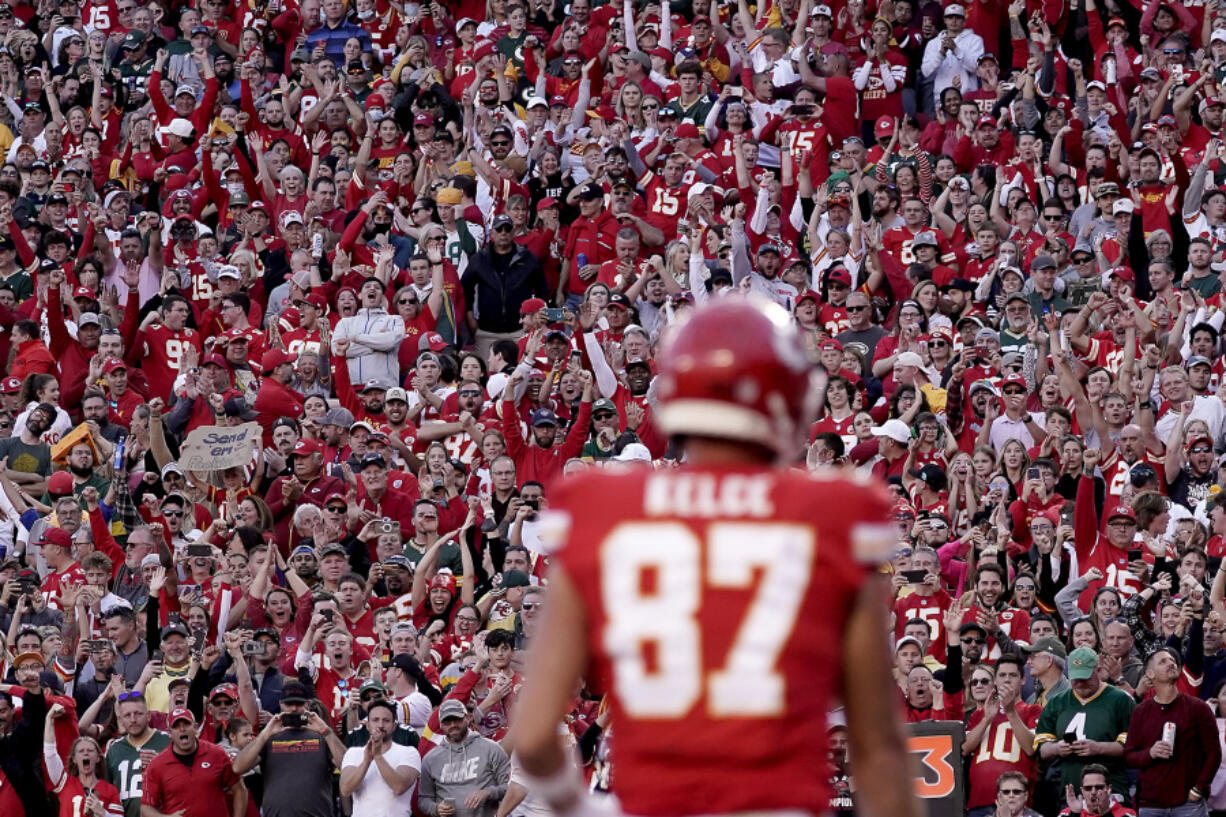 Fans cheer after Kansas City Chiefs tight end Travis Kelce scored a touchdown Nov. 7, 2021, in Kansas City, Mo.