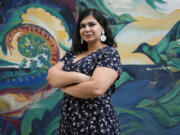 A Lebanese Armenian of Christian heritage, Talar Demirdjian, poses for a picture, in Beirut, Lebanon, Saturday, Sept. 2, 2023. The role of sectarian divisions in fueling conflicts in religiously diverse Lebanon is one reason Demirdjian kept her distance from religion. Demirdjian said that when it comes to religion, "I identify as I don't care...