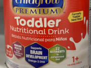 FILE - A can of toddler nutritional drink sits on a shelf in a grocery store in Surfside, Fla., on Friday, June 17, 2022. Powdered drink mixes that are widely promoted as "toddler milks" for older babies and children up to age 3 are unregulated, unnecessary and "nutritionally incomplete," the American Academy of Pediatrics warned Friday, Oct.