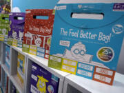 Products are displayed in the Open the Joy booth at the 2023 Toy Fair, in New York's Javits Center, Monday, Oct. 2, 2023. While still in its early phase, a growing number of toy marketers are embracing MESH -- or mental, emotional and social health -- as a designation for toys that teach kids skills like how to adjust to new challenges, resolve conflict, advocate for themselves, or solve problems.