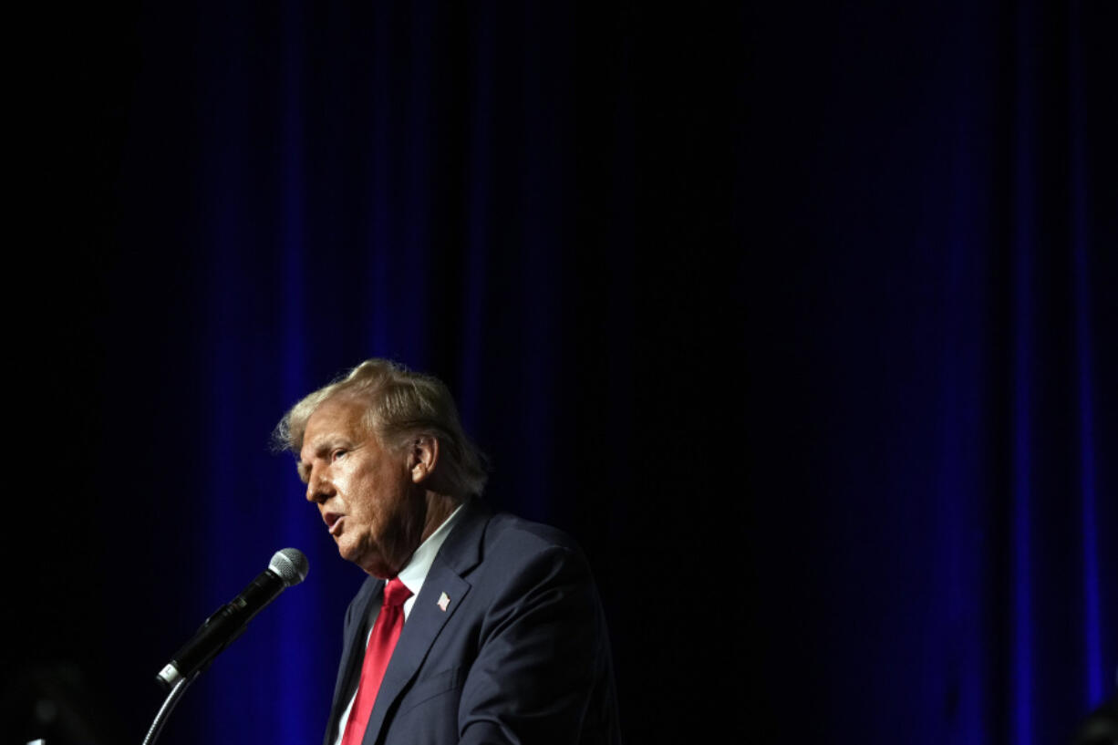 FILE - Republican presidential candidate former President Donald Trump speaks Wednesday, Oct. 11, 2023, at Palm Beach County Convention Center in West Palm Beach, Fla. Federal prosecutors and lawyers for Donald Trump will argue in court Monday, Oct. 16, over a proposed gag order aimed at reining in the former president's diatribes against likely witnesses and others in his 2020 election interference case in Washington.