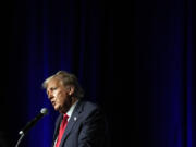 FILE - Republican presidential candidate former President Donald Trump speaks Wednesday, Oct. 11, 2023, at Palm Beach County Convention Center in West Palm Beach, Fla. Federal prosecutors and lawyers for Donald Trump will argue in court Monday, Oct. 16, over a proposed gag order aimed at reining in the former president's diatribes against likely witnesses and others in his 2020 election interference case in Washington.