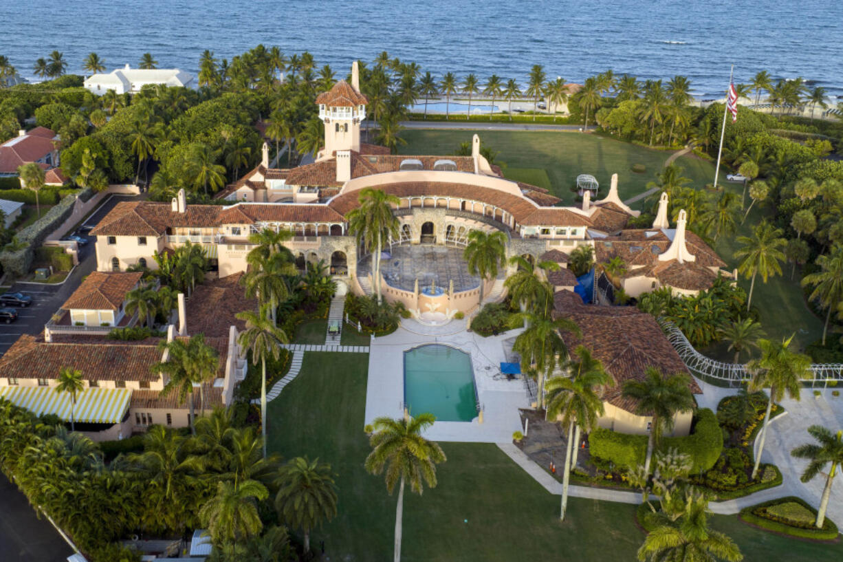 FILE - An aerial view of former President Donald Trump's Mar-a-Lago estate is seen Aug. 10, 2022, in Palm Beach, Fla. New York Judge Arthur Engoron, ruling in a civil lawsuit brought by New York Attorney General Letitia James, found that Trump and his company deceived banks, insurers and others by massively overvaluing his assets and exaggerating his net worth on paperwork used in making deals and securing loans.