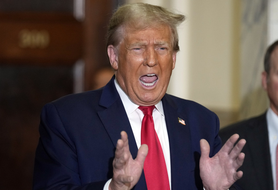 Former President Donald Trump arrives for his civil business fraud trial at New York Supreme Court, Tuesday, Oct. 17, 2023, in New York.