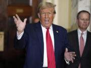 Former President Donald Trump arrives for his civil business fraud trial at New York Supreme Court, Tuesday, Oct. 17, 2023, in New York.