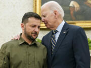 FILE - President Joe Biden meets with Ukrainian President Volodymyr Zelenskyy in the Oval Office of the White House, Thursday, Sept. 21, 2023, in Washington.