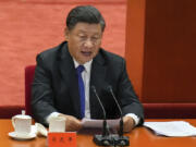 FILE - Chinese President Xi Jinping delivers a speech at an event commemorating the 110th anniversary of Xinhai Revolution at the Great Hall of the People in Beijing on Oct. 9, 2021. A new Pentagon report on China's military power says Beijing is on track to significantly increase its nuclear weapons arsenal by 2030 and is "almost certainly" learning from Russia's war in Ukraine.