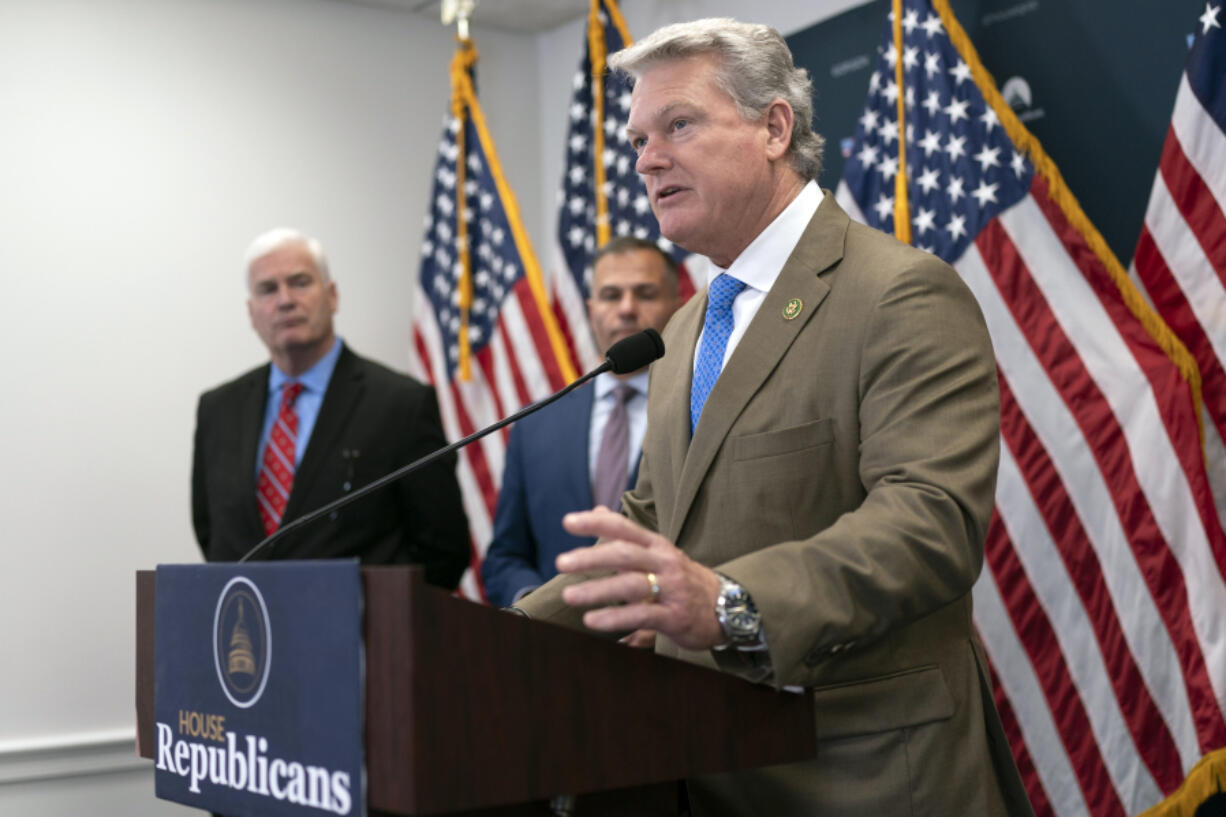 FILE - Rep. Mike Collins, R-Ga., a member of the House Committee on Transportation and Infrastructure, speaks to reporters following a closed-door meeting of the House Republican Conference, at the Capitol in Washington, July 18, 2023. To Collins, China is a bigger threat to the United States than Russia. So the Georgia Republican has voted against providing military aid to Ukraine as he advocates for doing more to arm Taiwan, the self-governed island that's at risk of military aggression from Beijing. (AP Photo/J.