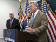 FILE - Rep. Mike Collins, R-Ga., a member of the House Committee on Transportation and Infrastructure, speaks to reporters following a closed-door meeting of the House Republican Conference, at the Capitol in Washington, July 18, 2023. To Collins, China is a bigger threat to the United States than Russia. So the Georgia Republican has voted against providing military aid to Ukraine as he advocates for doing more to arm Taiwan, the self-governed island that's at risk of military aggression from Beijing. (AP Photo/J.