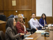 U.S. Magistrate Judge Youlee Yim You, left, talks to a group of students Thursday during the Color of Justice program at the Clark County Courthouse. The program, which started this year, invited middle school students to listen to a diverse panel of attorneys and judges speak about their legal careers.