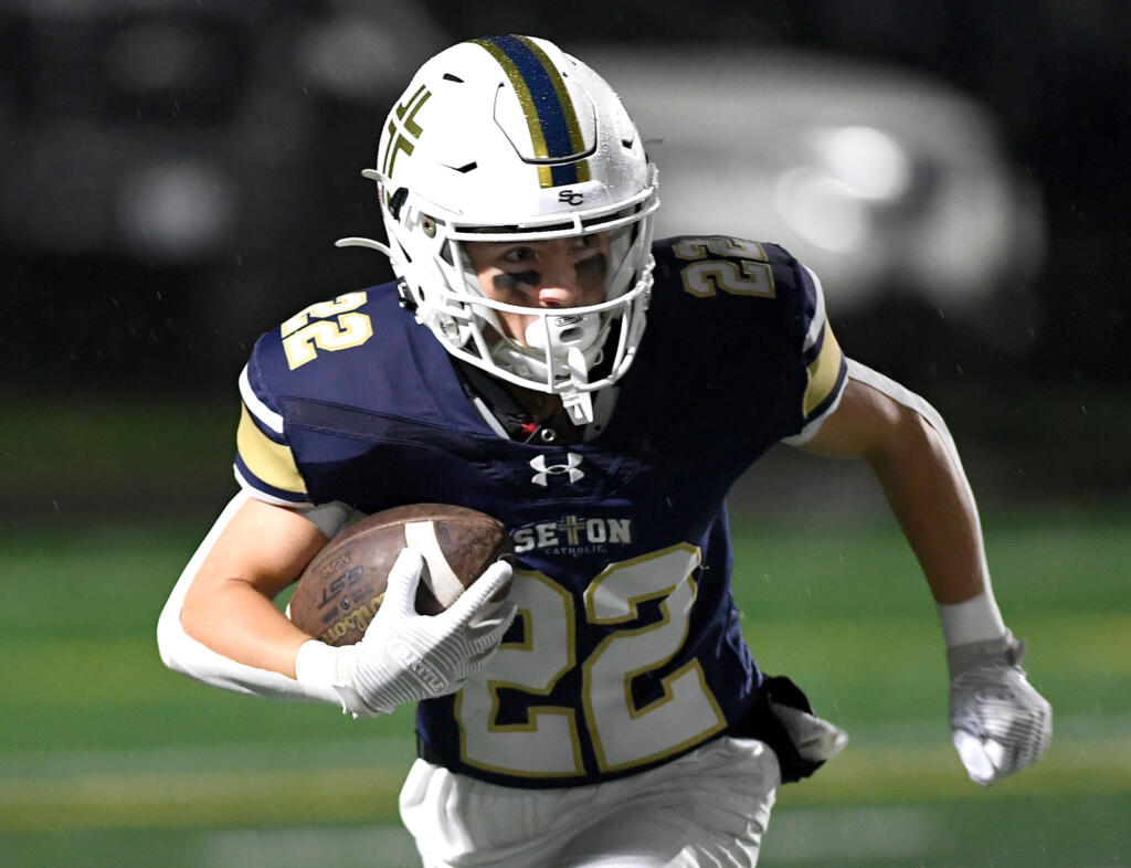 Seton Catholic sophomore Teddy Wieczorek runs with the football Friday, Nov. 3, 2023, during the Cougars’ 51-7 win against Tenino at Seton Catholic High School.