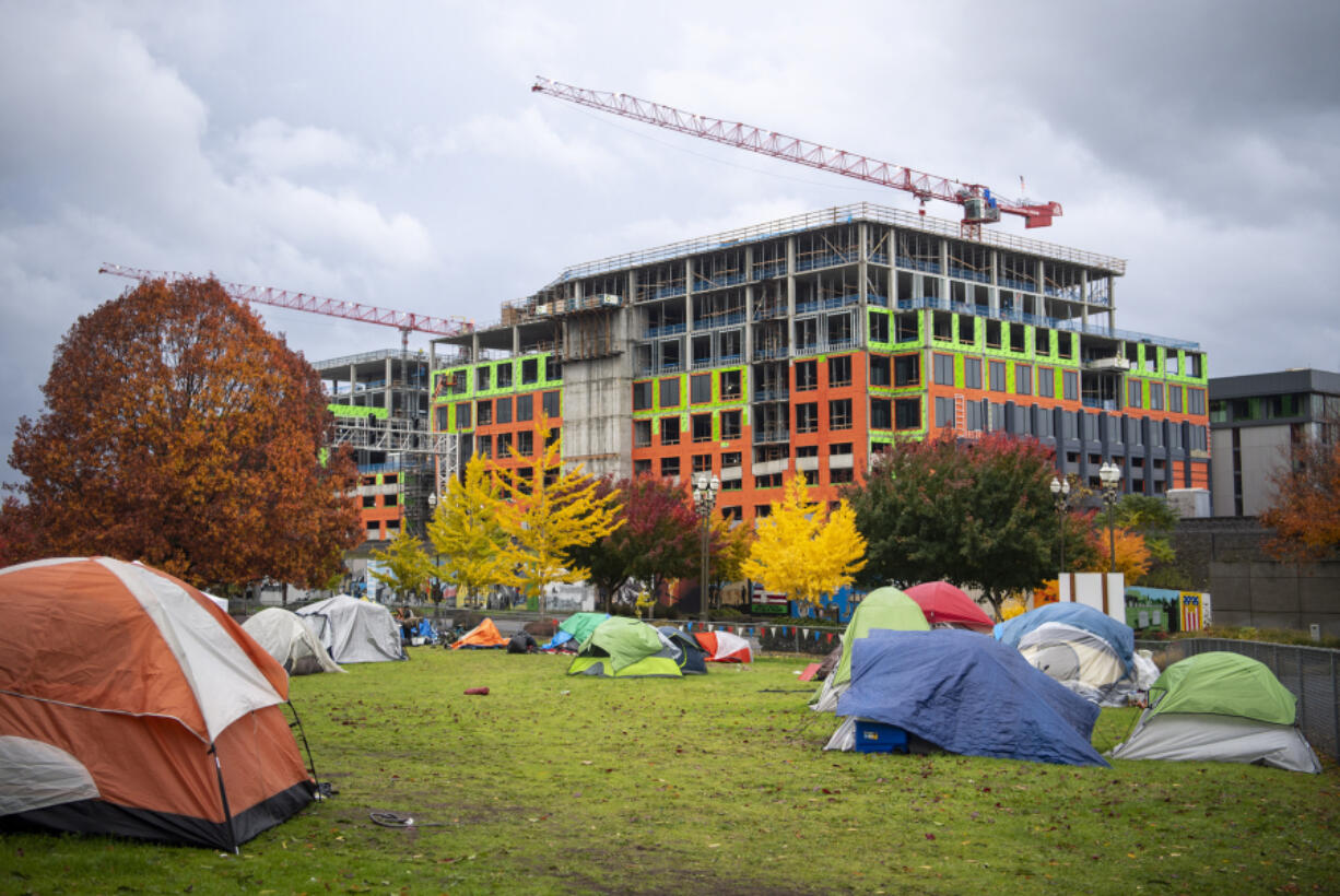 Tents sit in an empty lot behind Vancouver City Hall. Vancouver City Manager Eric Holmes declared a civic emergency on Friday in response to what the city describes as a "perfect storm" of increased criminal activity and drug use in camps and a growing disinterest among camp residents in getting help.