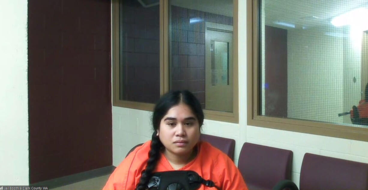 Mickleen Daniel, 20, of Portland, appears Tuesday in Clark County Superior Court on suspicion of two counts of vehicular homicide. She is accused of drunken driving when she crashed an SUV Sunday morning on state Highway 500, killing her two passengers.