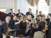 The Beacock Music Jazz Band brings the swing to Clearwater Springs Assisted Living one morning in November. Senior homes are &ldquo;a great circuit&rdquo; for senior musicians, said bandleader Gene Burton, on saxophone at front right.