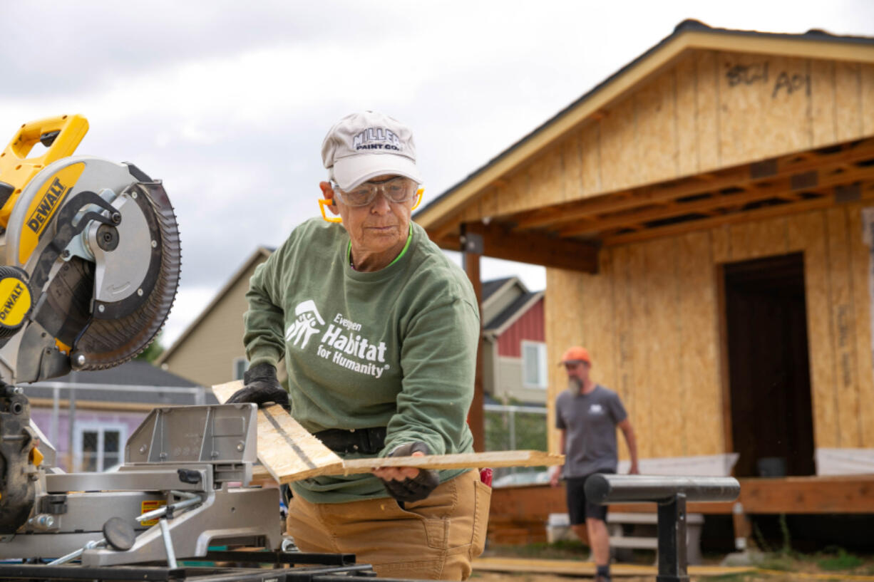 Volunteers work on a house at Evergreen Habitat for Humanity&rsquo;s Johnson Village subdivision in east Vancouver.