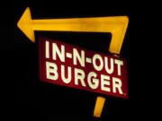 In-N-Out Burger sign in Camarillo, Calif., is seen at night.