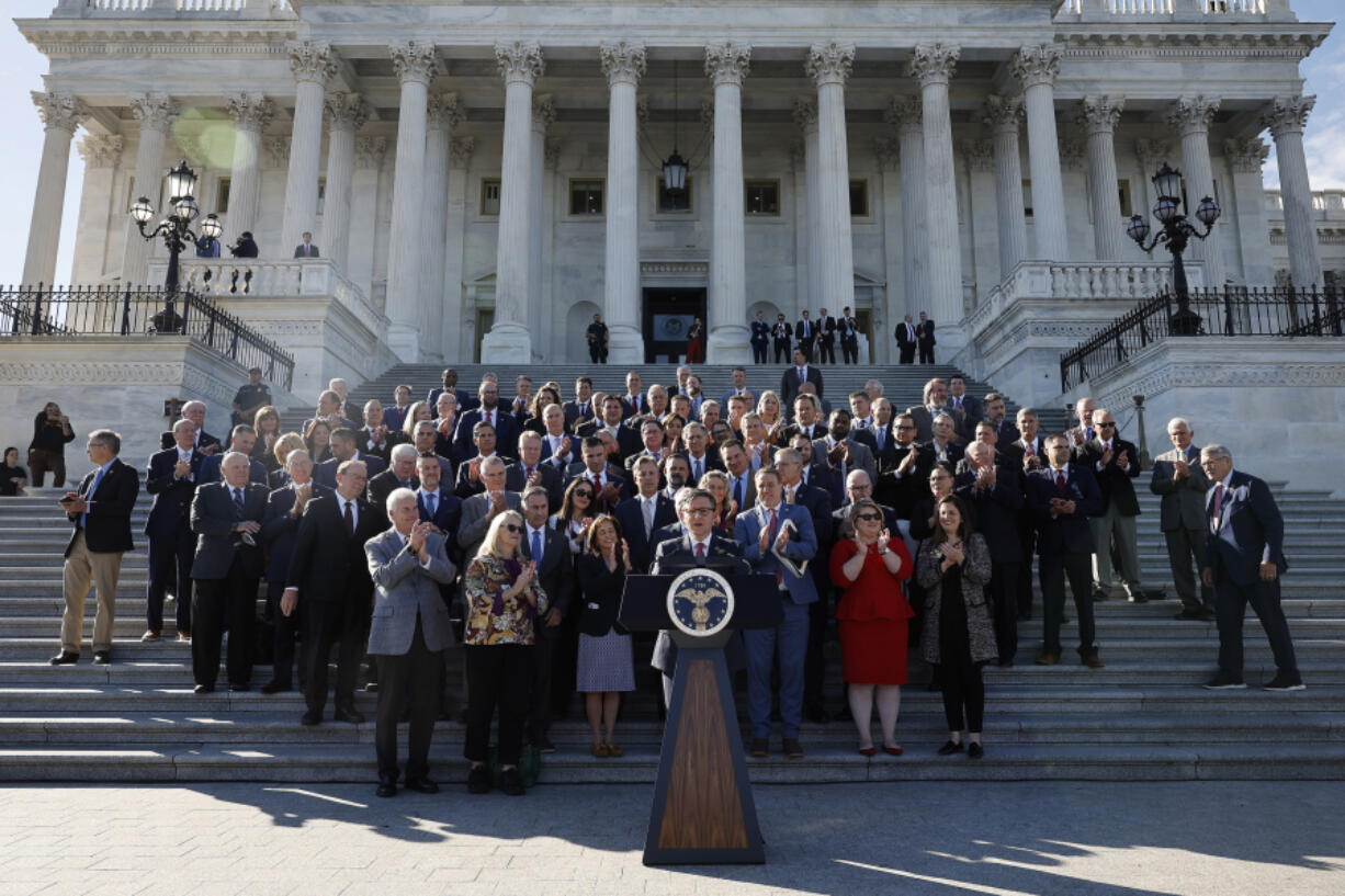 Newly elected U.S. Speaker of the House Mike Johnson (R-LA) delivers remarks with fellow Republicans on the East Front steps of the House of Representatives at the U.S. Capitol on Oct. 25, 2023, in Washington, D.C.