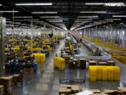 Amazon's immense multi-level warehouse, called a fulfillment center, in Kent, Washington.