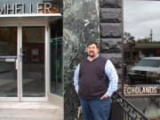 Everett Maroon, director of Walla Walla’s Blue Mountain Heart to Heart since 2010, in front of the building.