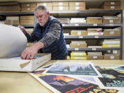 Doug Leen, a retired Seattle dentist, maintains a warehouse in Fremont for Ranger Doug Enterprises, on Nov. 1, 2022, in Seattle. A business that sells prints of the vintage national park posters he rescued from archival obscurity.