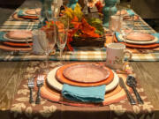 Thanksgiving decor lends itself to warm, earthy colors with the glow of candles and warm feelings.