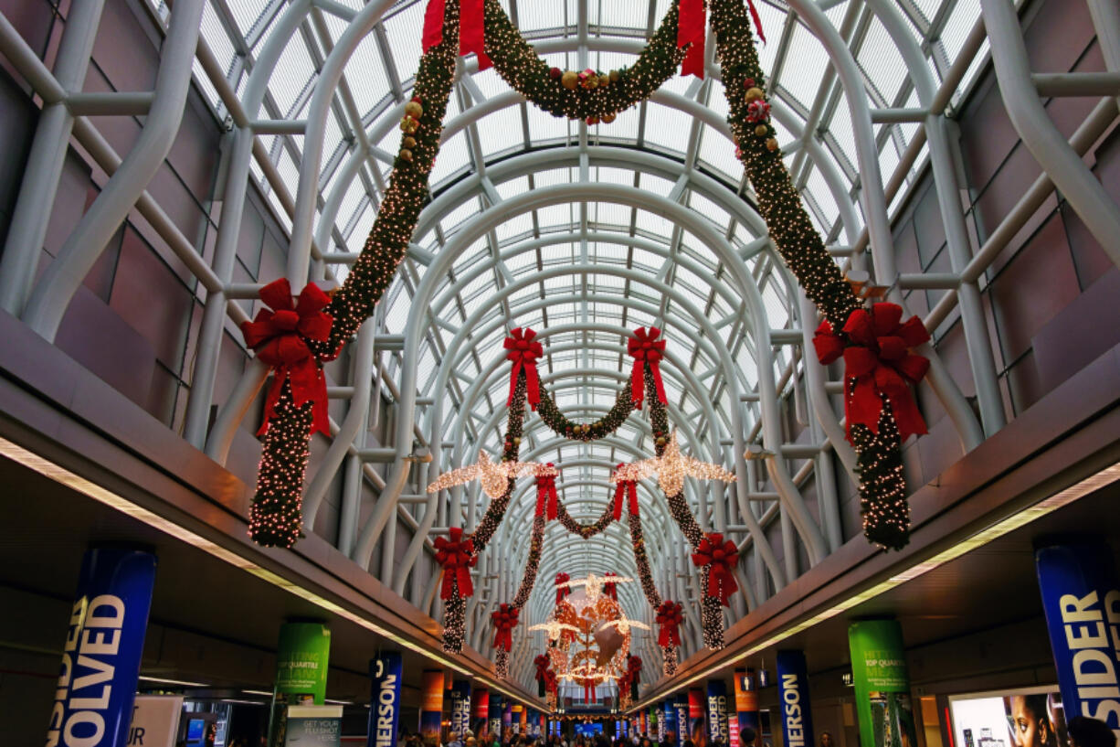 Christmas lights and decorations inside the O&rsquo;Hare International Airport terminal in Chicago.