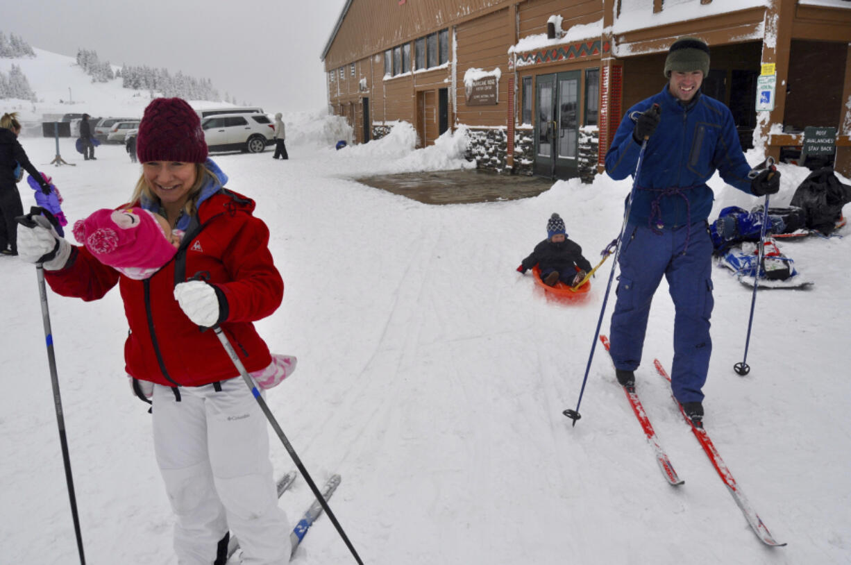 Skiers make their way at Hurricane Ridge in Olympic National Park on Jan. 22, 2017. The area will reopen next week after a closure so crews could demolish and remove what was left of Hurricane Ridge Day Lodge, which burned down in May.