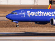 Southwest Airlines plane arrives to the Dallas Love Field in Dallas on Thursday, Jan. 19, 2023.