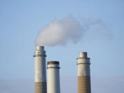 AES Indiana Petersburg Generating Station, a coal-fired power plant, operates in Petersburg, Ind., on Wednesday, Oct. 25, 2023. (AP Photo/Joshua A.