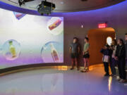 Views of the new beverage lab at The World of Coca Cola on Nov. 7, 2023. The new immersive experience offers guests a chance to explore the science behind Coca Cola&rsquo;s beverages.