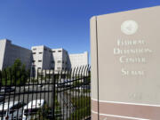 The photo shows the Federal Detention Center in SeaTac in 2018.